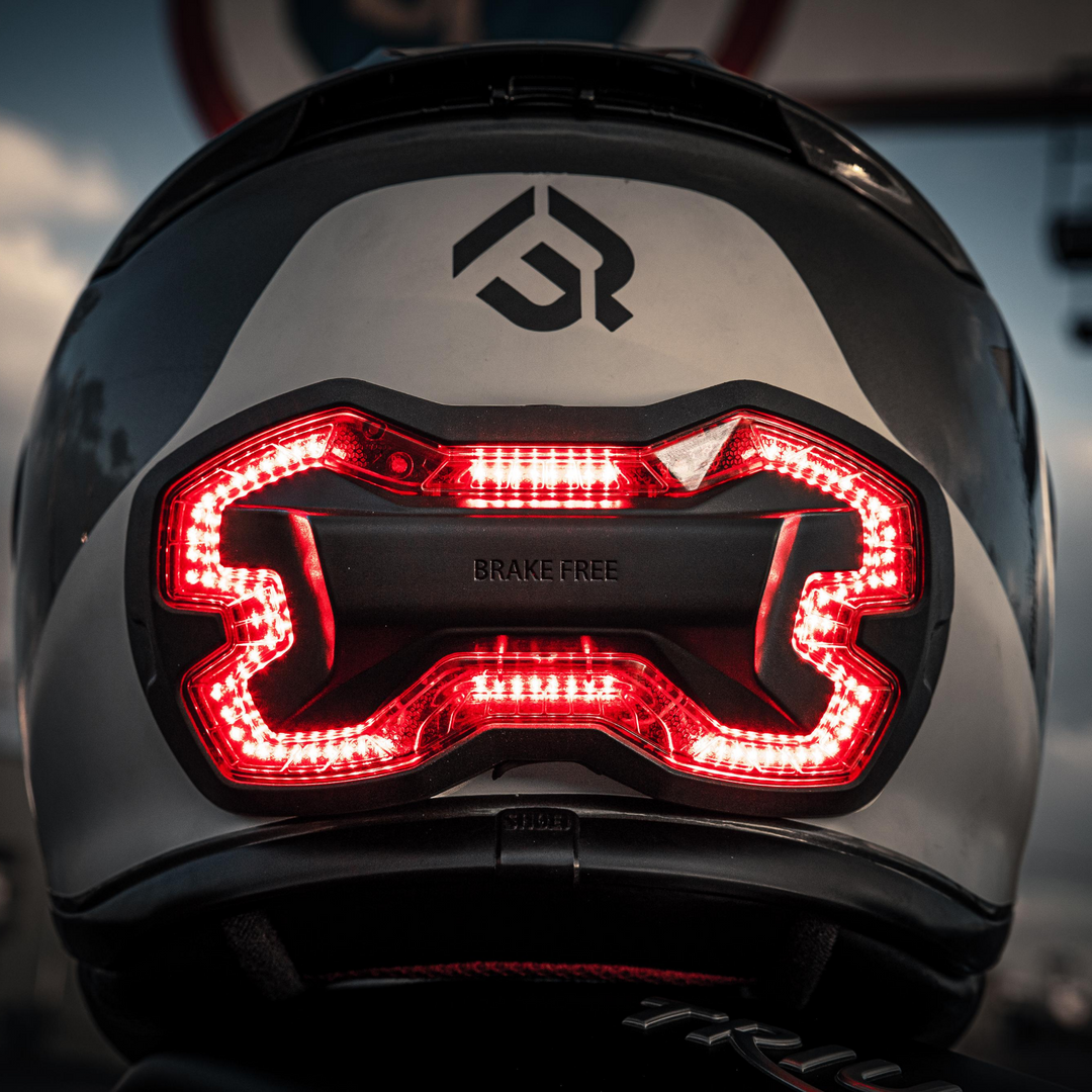 Brake Free - an ultra-bright smart LED brake light that instantly improves rider's visibility. Simple installation, no wires. Smart brake light for your helmet. Be seen day and night. Ride in any weather. Long lasting rechargeable lithium ion battery.